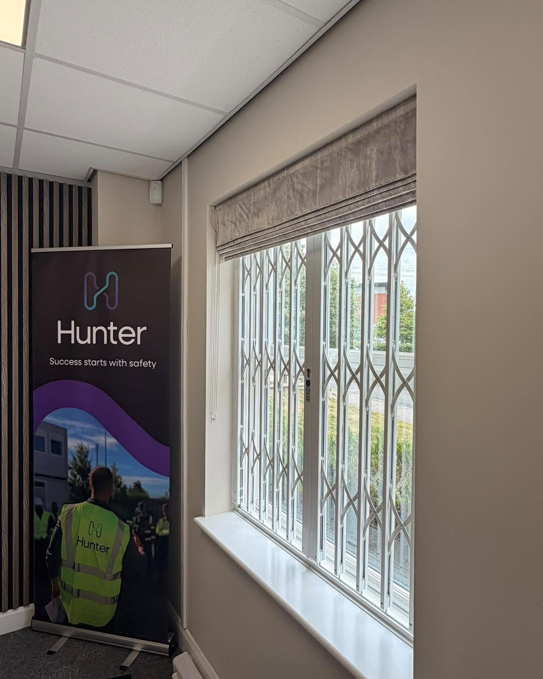 Roman blind in Hunter office window